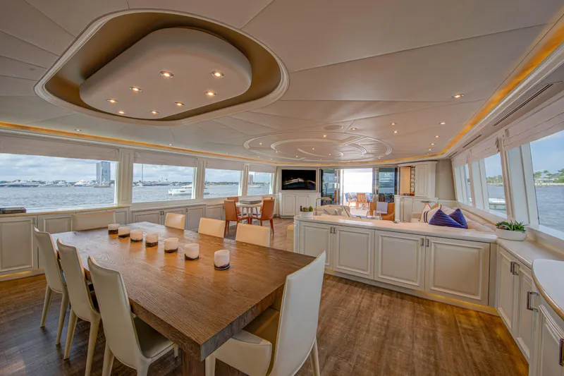 Spirit Yacht Photos Pics Luxurious interior of 2010 Westport 112 yacht with dining area and panoramic windows.