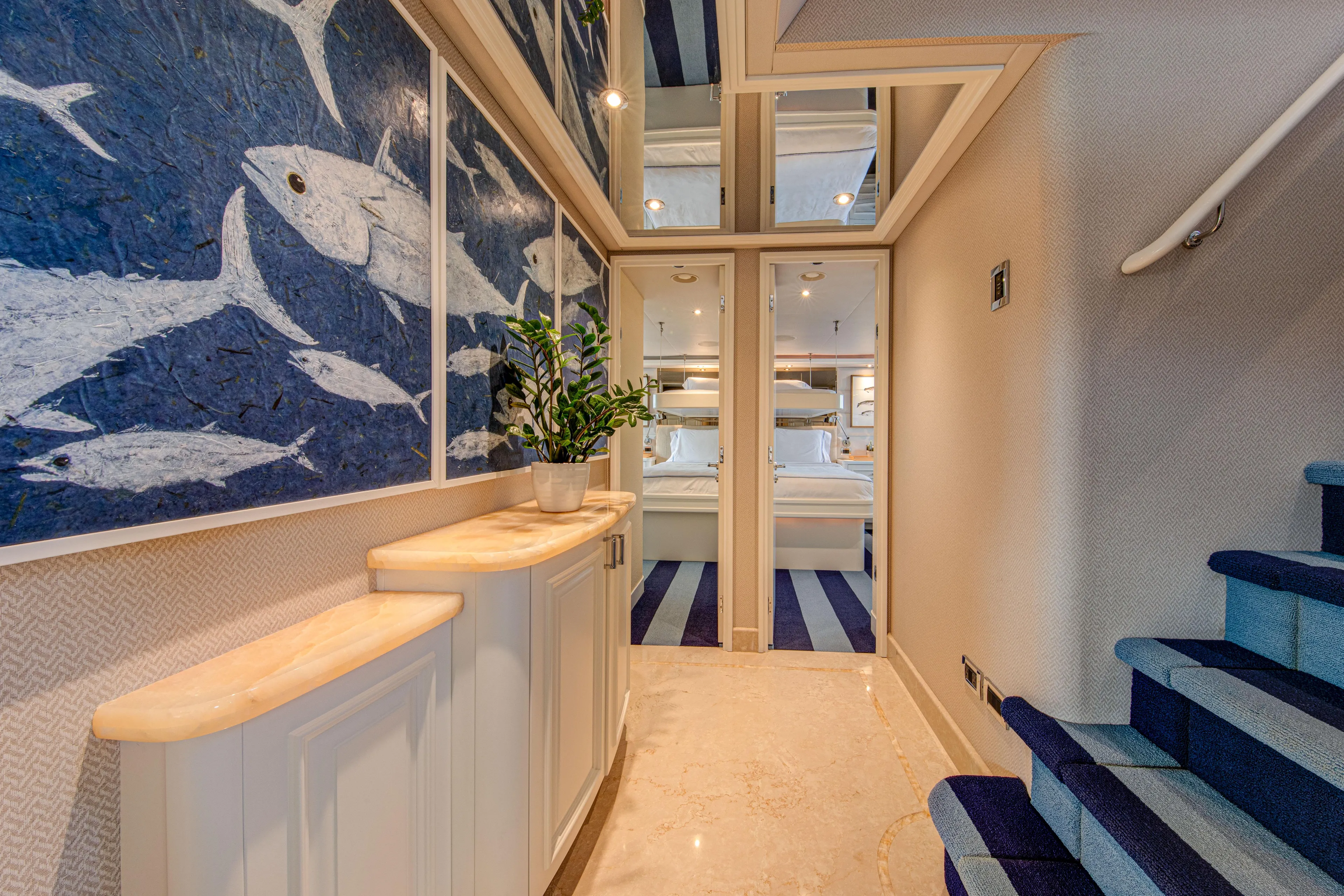 Spirit Yacht Photos Pics Luxurious hallway in a 2010 Westport 112 yacht with marine-themed decor.