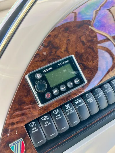  Yacht Photos Pics Control panel of 1999 Fairline Targa 48 Open with Fusion MS-NRX300 audio system.