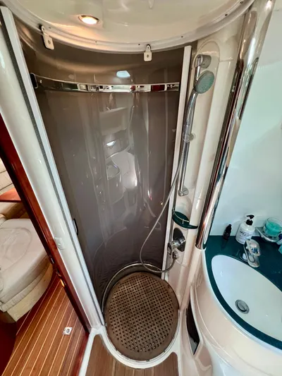  Yacht Photos Pics Shower area in 1999 Fairline Targa 48 Open yacht, featuring modern fixtures and compact design.