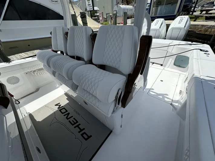  Yacht Photos Pics Luxury seating on 2025 Phenom 37 boat with white upholstery and sleek design.