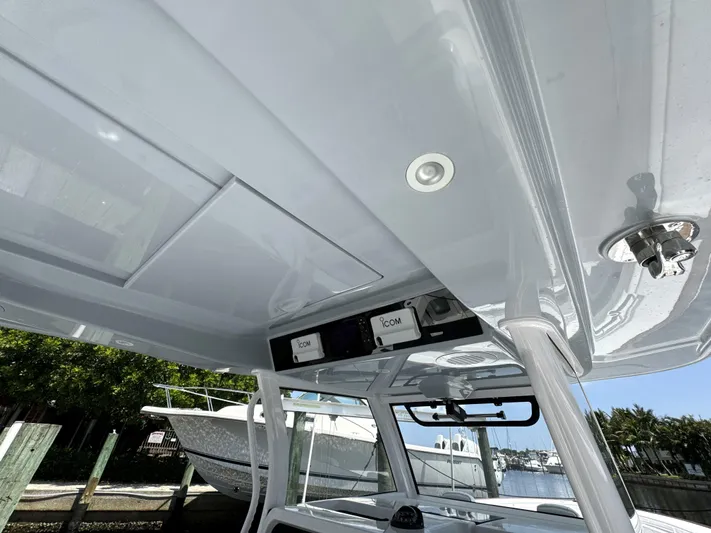  Yacht Photos Pics Phenom 37 boat interior ceiling with modern design, 2025 model.