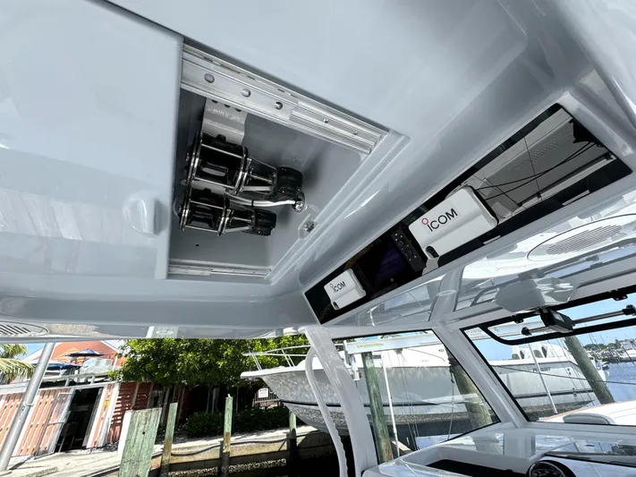  Yacht Photos Pics Interior view of a 2025 Phenom 37 boat, showcasing electronic equipment and sleek design.