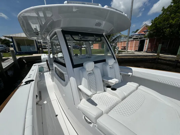  Yacht Photos Pics Luxury Phenom 37 boat, 2025 model, featuring sleek white seating and modern design.