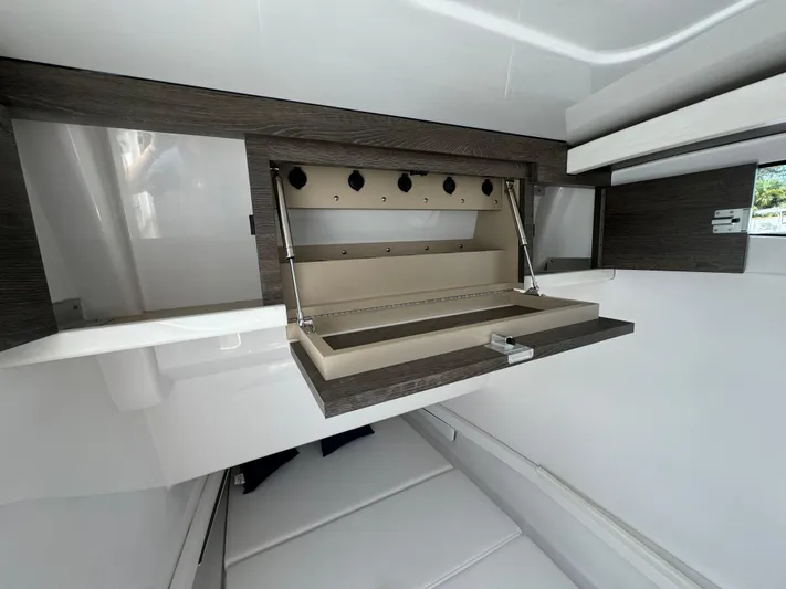  Yacht Photos Pics Modern interior storage compartment in a 2025 Phenom 37 yacht.