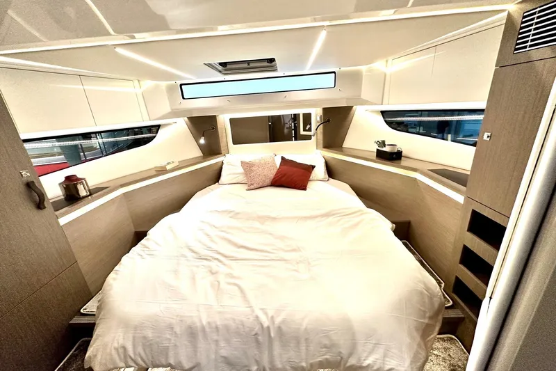  Yacht Photos Pics Luxurious cabin interior of 2026 Jeanneau Merry Fisher 1295 Fly yacht.
