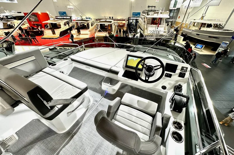  Yacht Photos Pics Flybridge view of 2026 Jeanneau Merry Fisher 1295 Fly at a boat show.