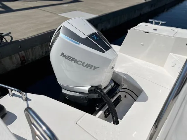 Ala #210 In Stock Yacht Photos Pics 2023 Nimbus W9 boat with Mercury outboard engine at dockside.