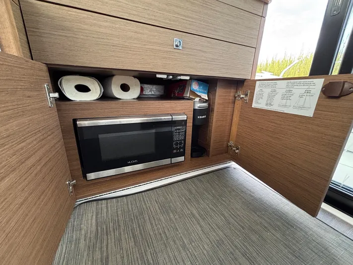 Knot Work'n Yacht Photos Pics 2020 Jeanneau NC895 with storage cabinet with microwave