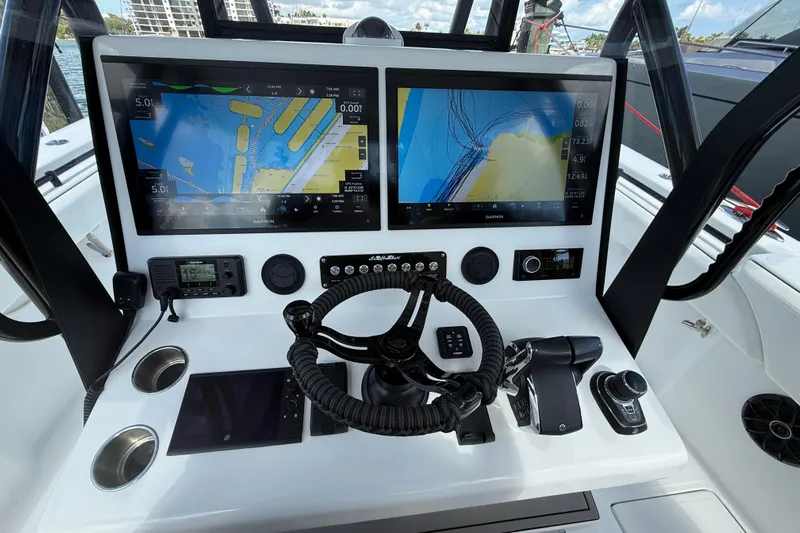  Yacht Photos Pics 2024 SeaHunter 35 Tournament helm with dual Garmin displays and advanced navigation controls.