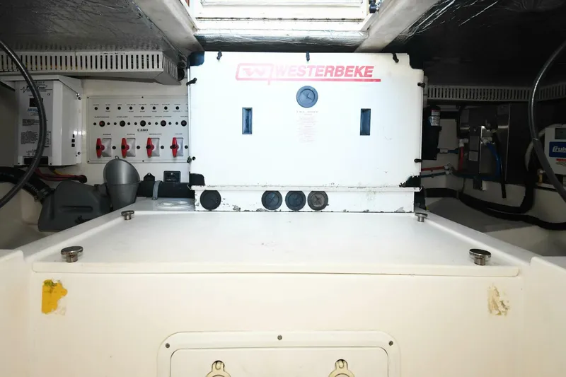 Vikingos Yacht Photos Pics Engine room of a 2001 Cabo 35 Flybridge with Westerbeke generator.