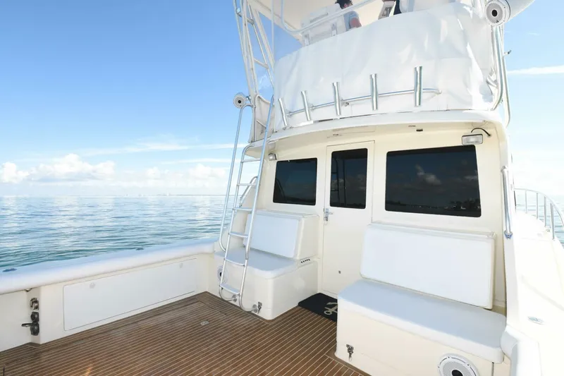 Vikingos Yacht Photos Pics 2001 Cabo 35 Flybridge boat with spacious deck and ocean view.