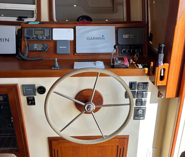 Endurance Yacht Photos Pics 2006 Duffy Pilothouse Fast Trawler helm with Garmin navigation and communication equipment.