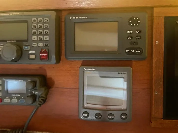 Endurance Yacht Photos Pics Control panel of a 2006 Duffy Pilothouse Fast Trawler with navigation instruments.