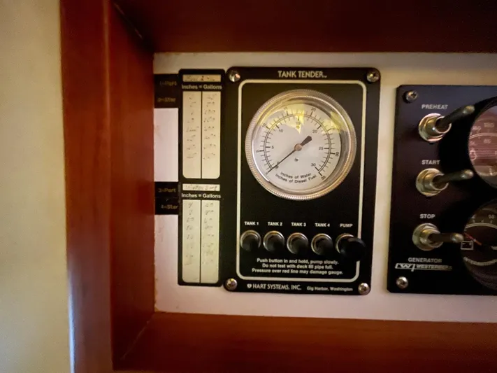 Endurance Yacht Photos Pics Tank tender gauge on 2006 Duffy Pilothouse Fast Trawler, showing fuel levels and controls.