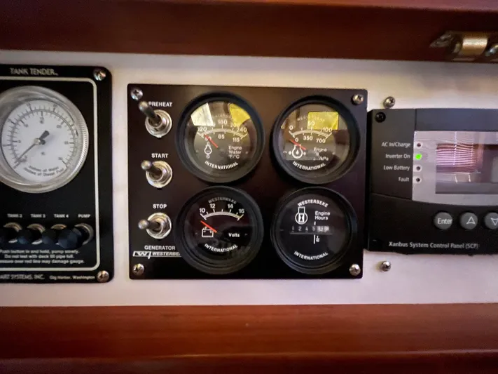 Endurance Yacht Photos Pics Control panel of a 2006 Duffy Pilothouse Fast Trawler with gauges and switches.