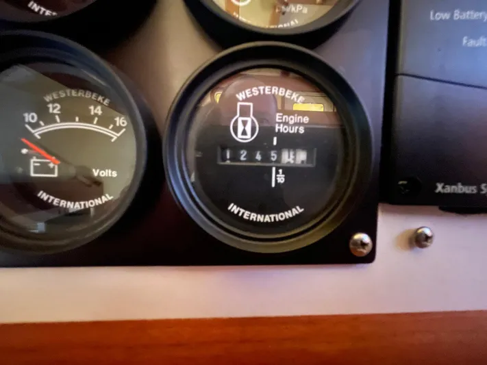 Endurance Yacht Photos Pics Close-up of Westerbeke engine hour meter on 2006 Duffy Pilothouse Fast Trawler.
