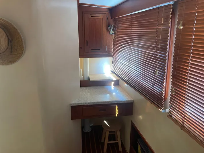 Endurance Yacht Photos Pics 2006 Duffy Pilothouse Fast Trawler interior with wooden blinds and compact desk area.