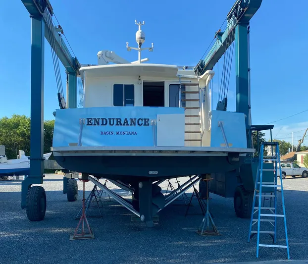 Endurance Yacht Photos Pics 2006 Duffy Pilothouse Fast Trawler "Endurance" on boat lift, Basin, Montana.