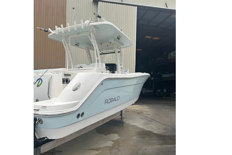 302-176 Brokerage Anthony Yacht Photos Pics 2018 Robalo R302 Center Console boat in storage facility.