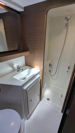 Solace Yacht Photos Pics 2020 Lagoon 42 yacht bathroom with modern sink and shower.