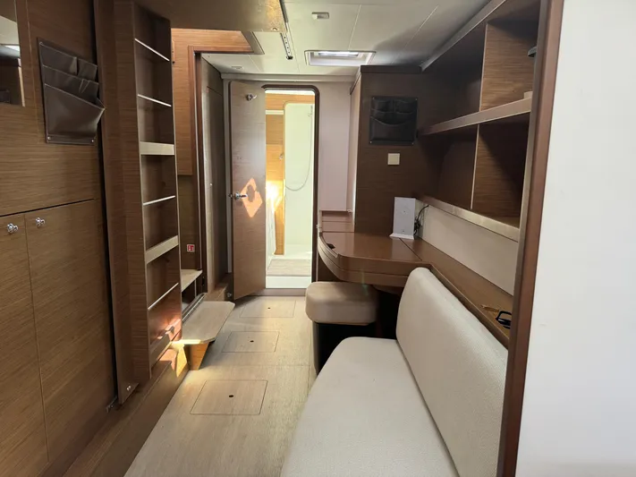 Solace Yacht Photos Pics Interior of 2020 Lagoon 42 yacht with modern wood finish and comfortable seating.