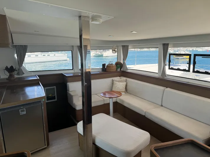 Solace Yacht Photos Pics Interior of 2020 Lagoon 42 yacht with spacious seating and ocean view.