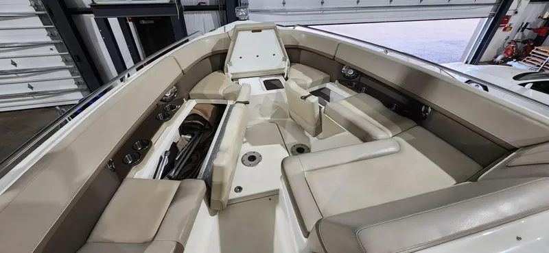  Yacht Photos Pics 2015 Formula 350 CBR boat interior with beige seating and cup holders.