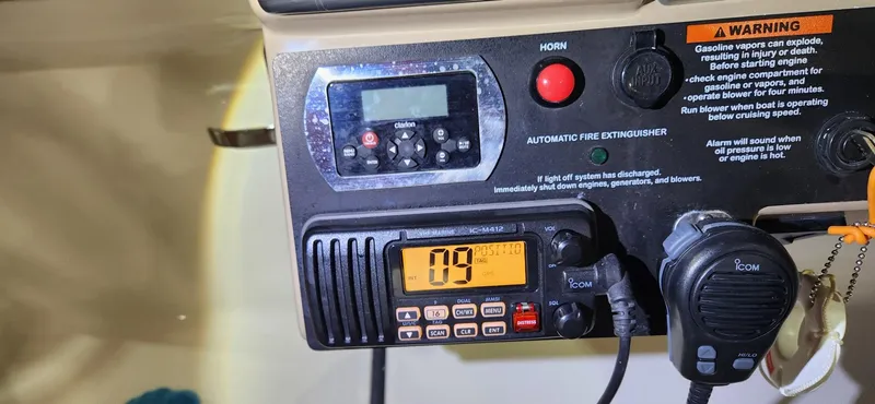  Yacht Photos Pics Control panel of a 2015 Formula 350 CBR boat with radio and safety features.