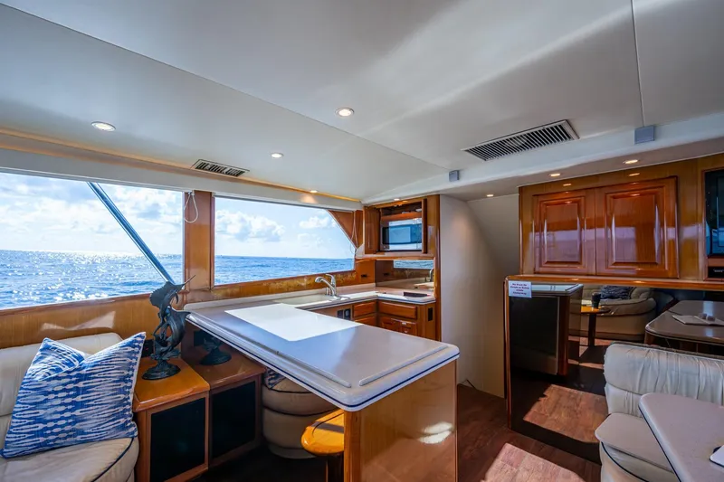 Navigator Yacht Photos Pics Luxurious interior of 1998 Viking 50 Convertible yacht with ocean view and modern amenities.