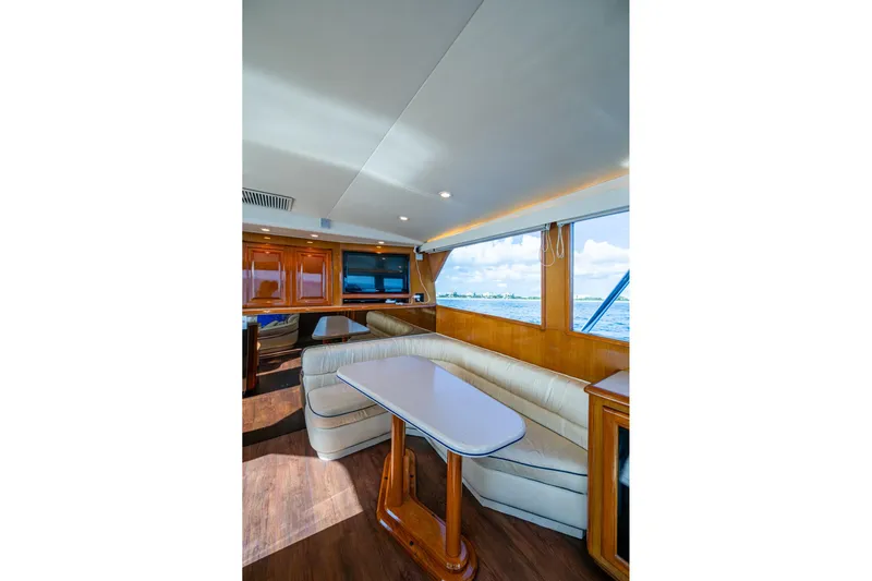 Navigator Yacht Photos Pics Interior of 1998 Viking 50 Convertible yacht with elegant seating and ocean view.