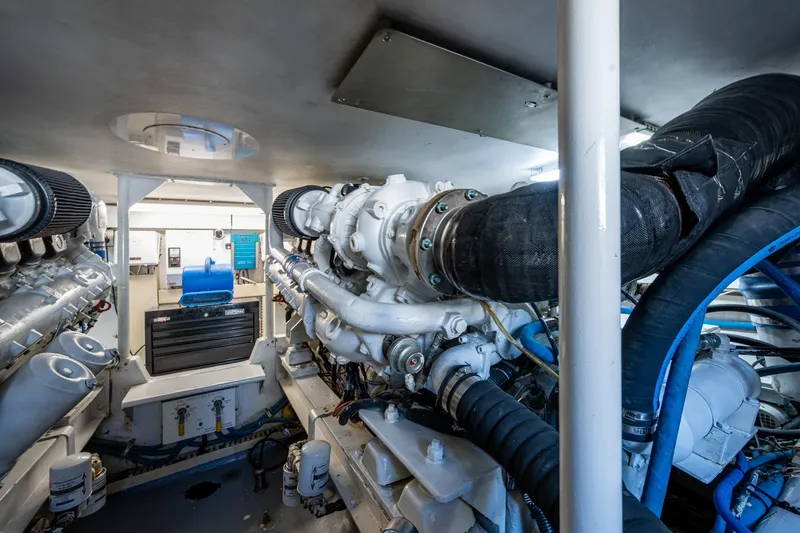 Navigator Yacht Photos Pics Engine room of 1998 Viking 50 Convertible yacht, showcasing machinery and components.