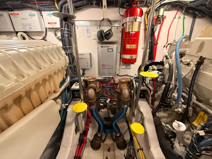 Gonzo Yacht Photos Pics Engine room of 2004 Tiara Yachts 42 Open with wiring and fire extinguisher.