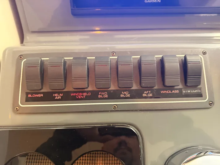 Gonzo Yacht Photos Pics Control panel of 2004 Tiara Yachts 42 Open with various switches.