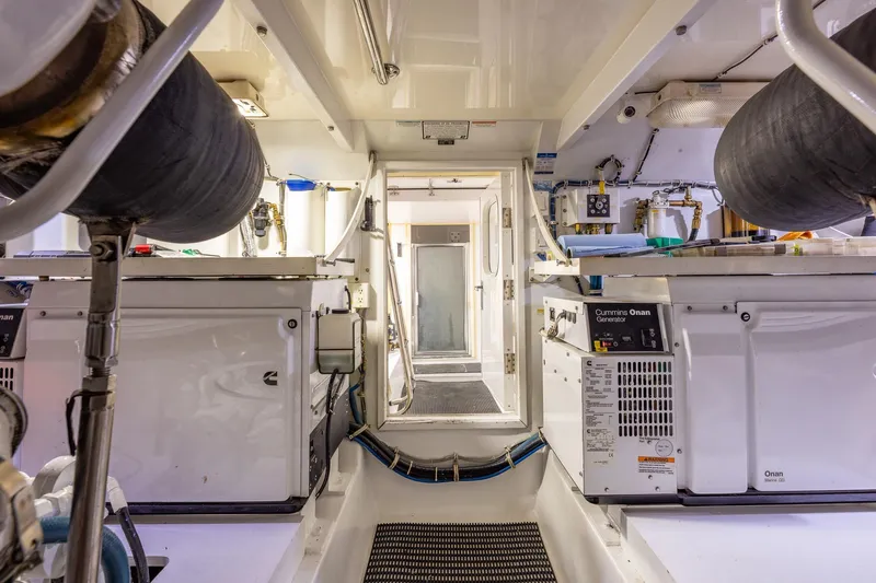 Starka Yacht Photos Pics Engine room of 2009 Hatteras 64 Motor Yacht with Cummins Onan generator.