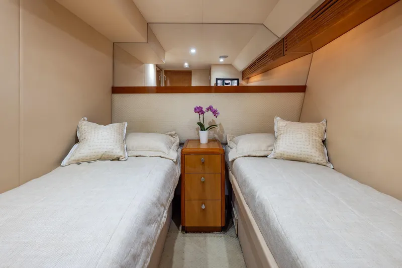 Starka Yacht Photos Pics Luxurious twin cabin in 2009 Hatteras 64 Motor Yacht with elegant decor.