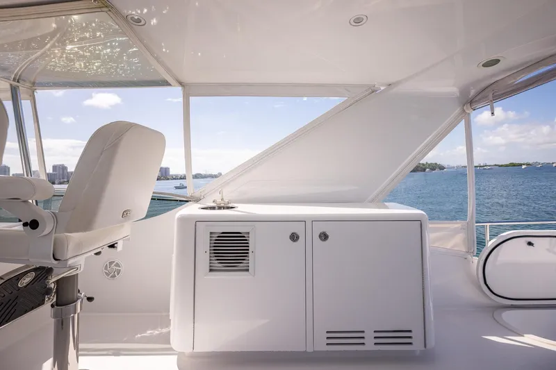 Starka Yacht Photos Pics 2009 Hatteras 64 Motor Yacht helm with ocean view and seating.