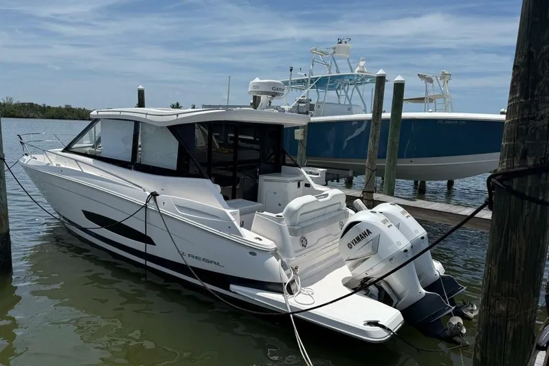  Yacht Photos Pics 2021 Regal 36 XO boat docked with Yamaha outboard engines.