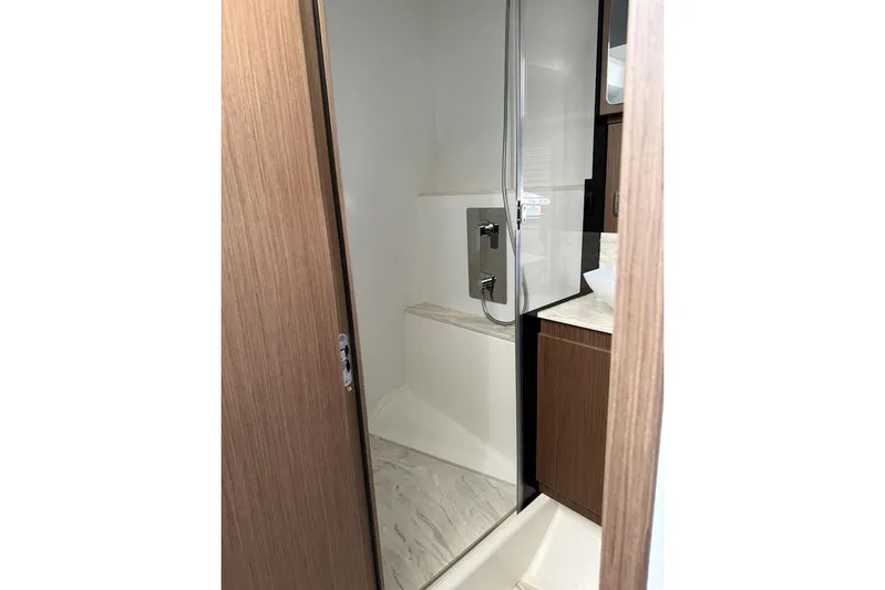  Yacht Photos Pics Modern bathroom in 2025 Prestige F4.9 model with sleek shower design.