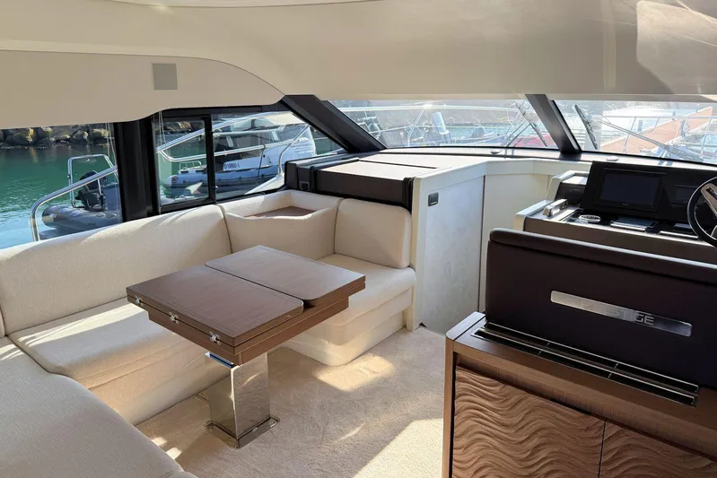  Yacht Photos Pics Luxurious interior of 2025 Prestige F4.9 yacht with elegant seating and modern design.
