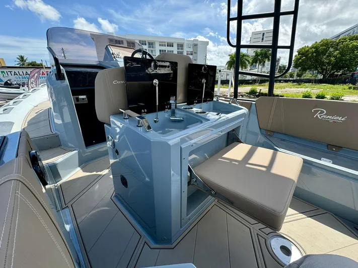  Yacht Photos Pics Interior of 2025 Ranieri CAYMAN 28 EXECUTIVE boat with modern seating and control console.