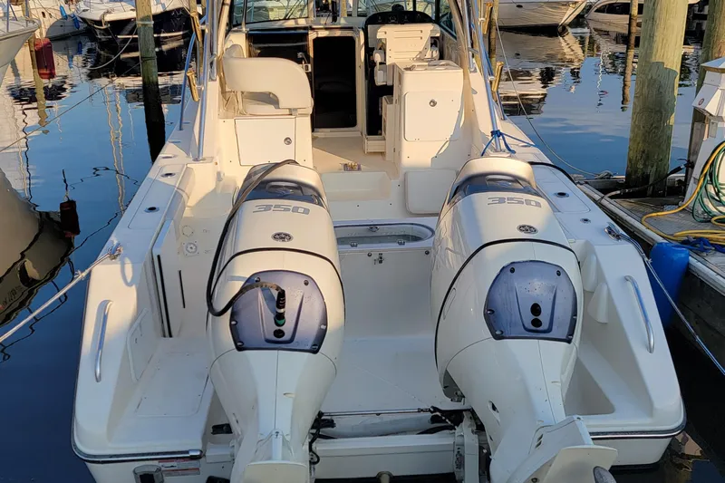  Yacht Photos Pics 2007 Pursuit OS 335 Offshore boat with twin 350 engines docked at marina.