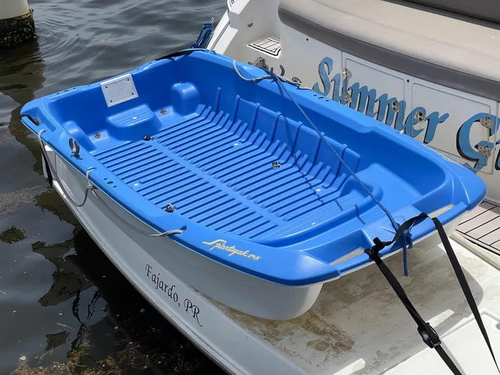 Summer Girl Yacht Photos Pics Blue dinghy attached to 2007 Cruisers Yachts 497 Sport Sedan, docked in Fajardo, PR.