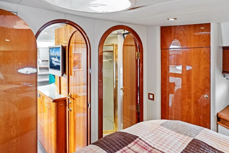  Yacht Photos Pics Luxurious 2003 Neptunus 56 Express yacht interior with wood finishes and modern amenities.