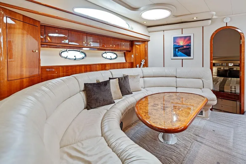  Yacht Photos Pics Luxurious interior of 2003 Neptunus 56 Express yacht with elegant seating and wood finishes.
