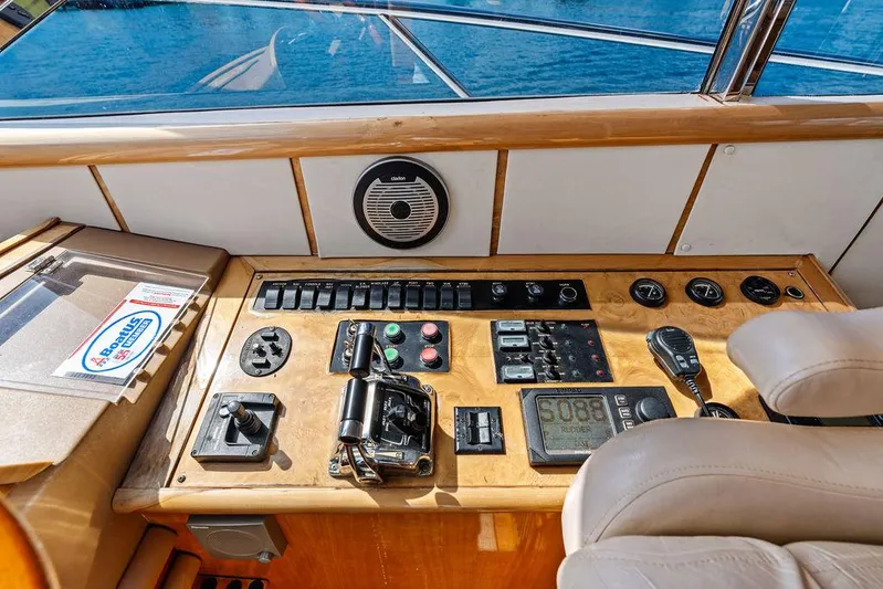  Yacht Photos Pics Control panel of a 2003 Neptunus 56 Express yacht with gauges and controls.