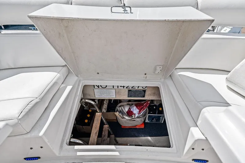  Yacht Photos Pics Open storage compartment on 2003 Neptunus 56 Express yacht with beverages inside.