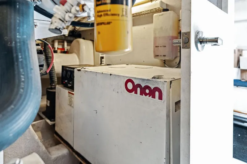  Yacht Photos Pics Engine room of 2003 Neptunus 56 Express with Onan generator.