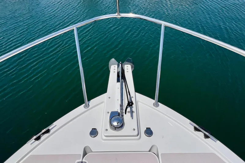 Cabrillo Yacht Photos Pics Bow view of 2008 Back Cove 33 Express boat on calm water.