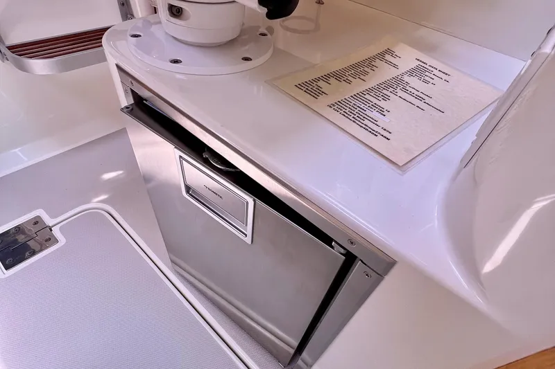 Cabrillo Yacht Photos Pics 2008 Back Cove 33 Express interior with stainless steel fridge and control panel.